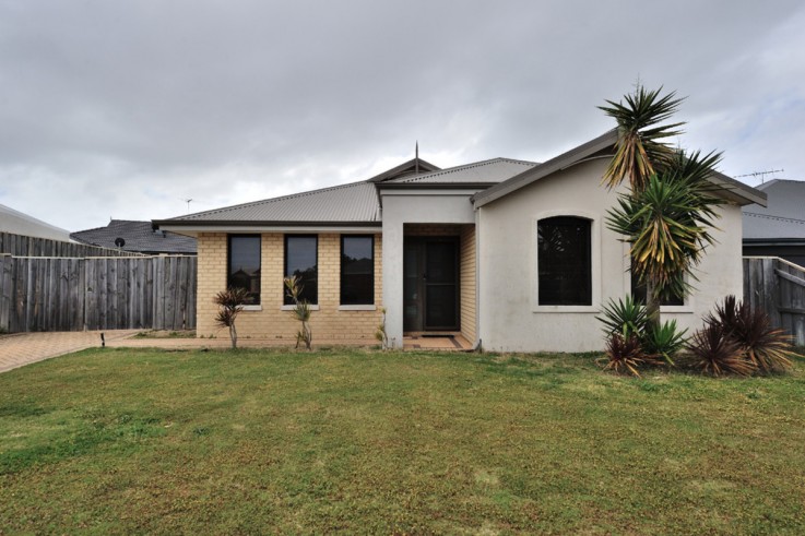 BEAUTIFULLY PRESENTED BEACH SIDE HOME