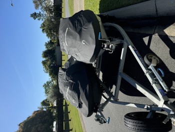 Two Sea-Doo jet Skis on dual trailer