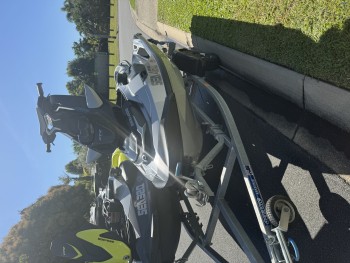 Two Sea-Doo jet Skis on dual trailer